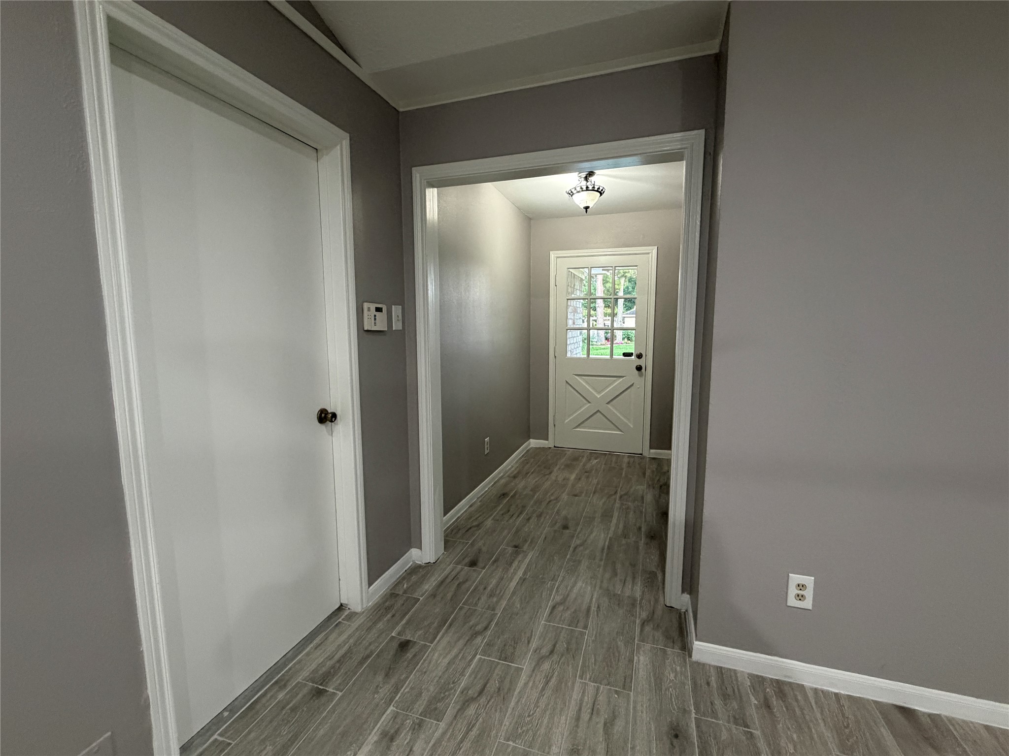 3815 Avenue R Rosenberg, TX 77471 - Photo 5 of 14 a view of a hallway with wooden floor