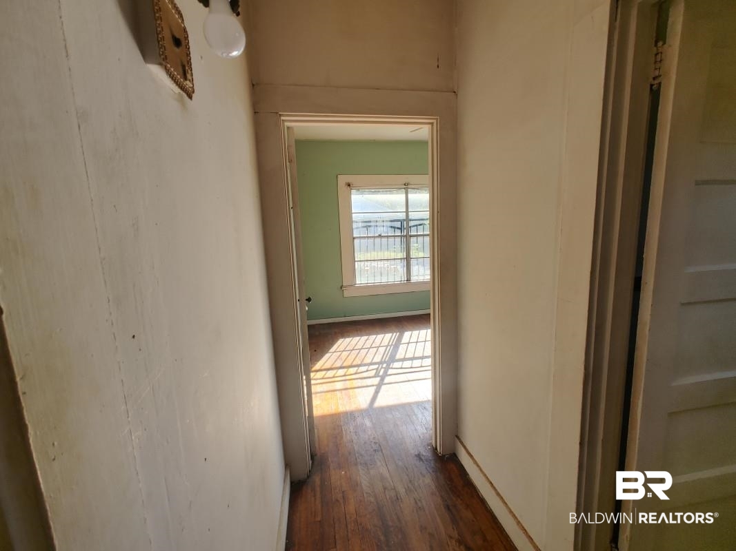 1706 Lomeroy Street Mobile, AL 36604 - Photo 16 of 24 Hall featuring dark wood finished floors