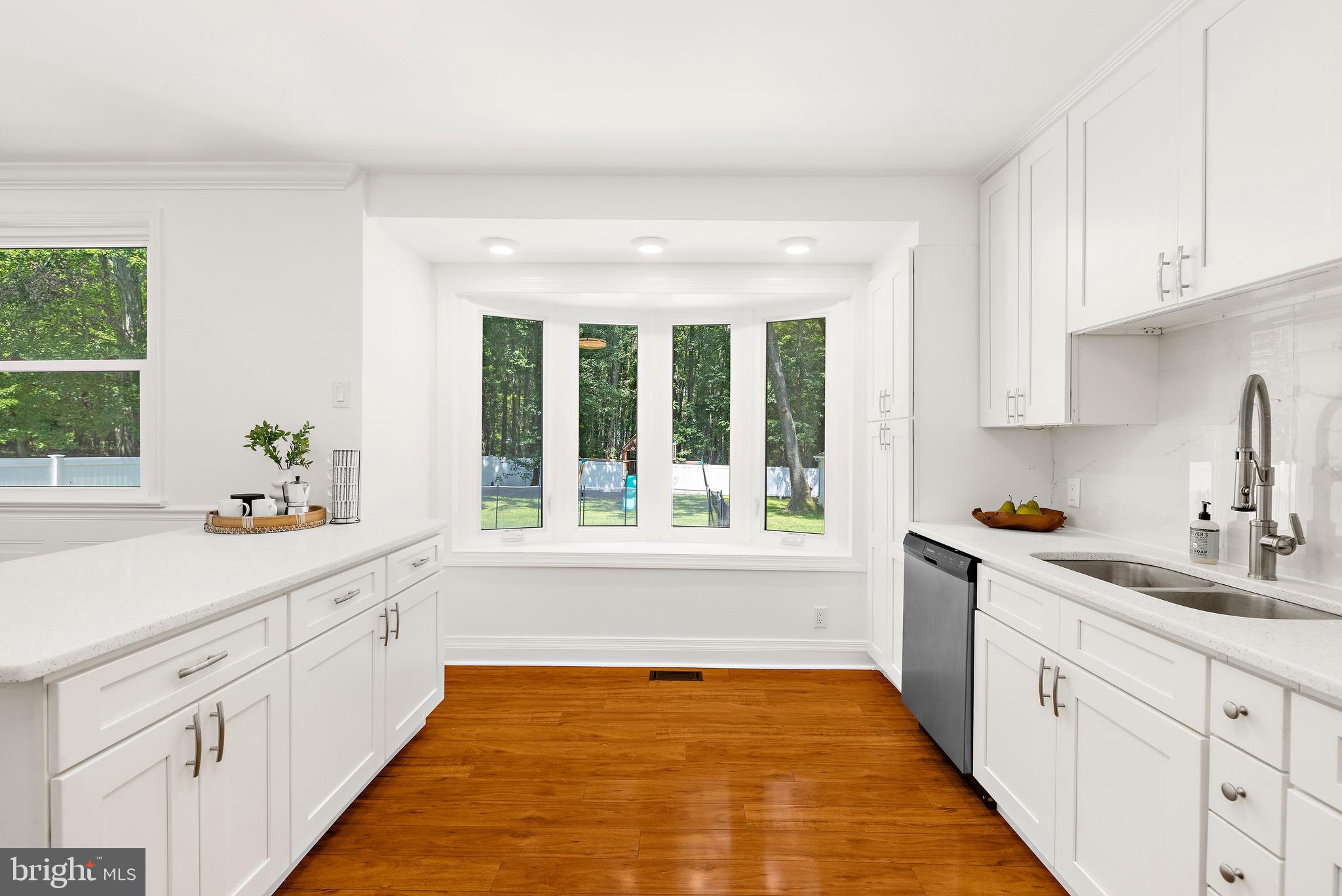 8311 Jacobs Road West Severn, MD 21144 - Photo 22 of 49 Another main kitchen view - and bay window.