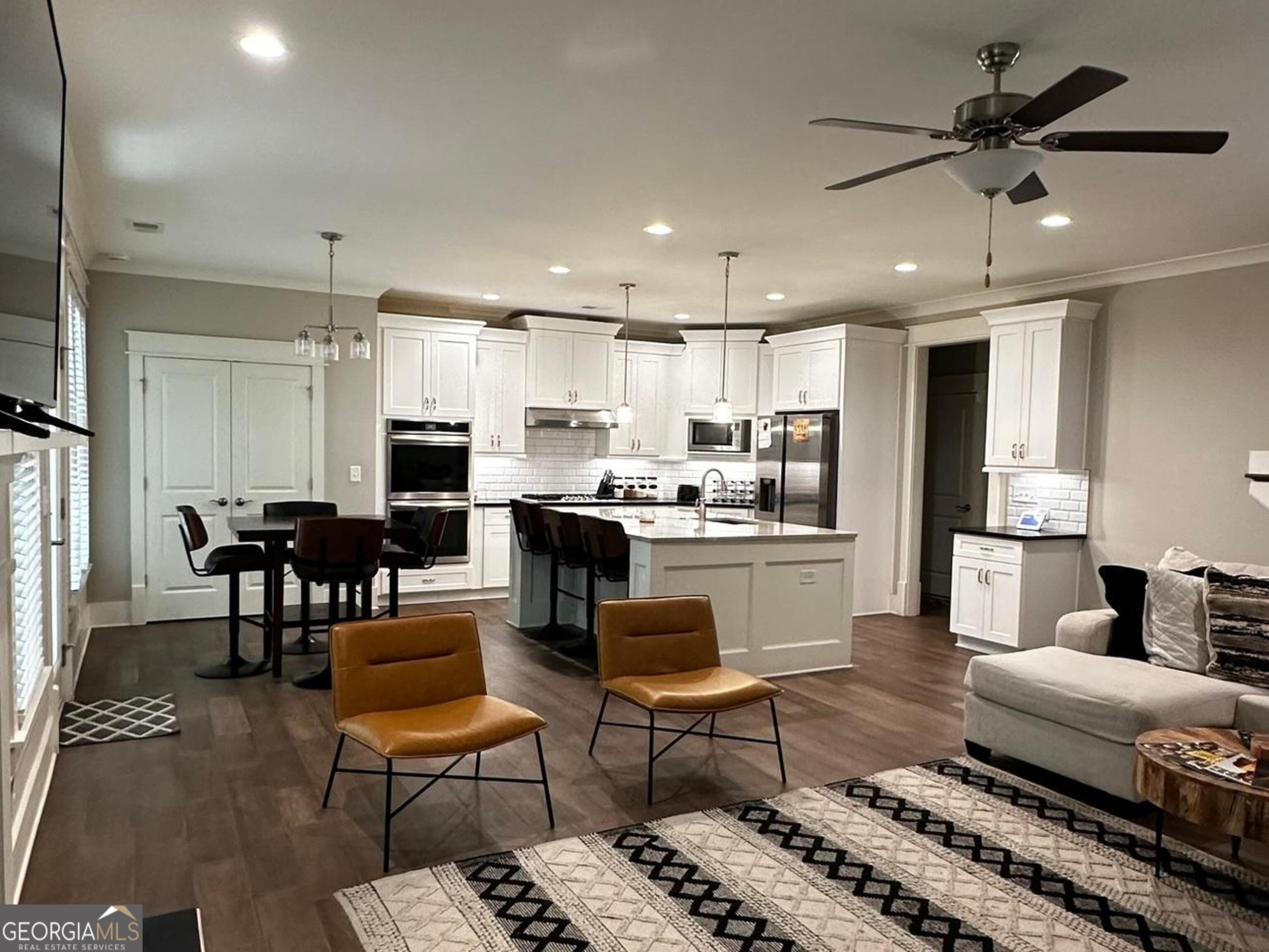 6247 Allen Ivey Road Mableton, GA 30126 - Photo 11 of 20 a living room kitchen with furniture and a view of kitchen