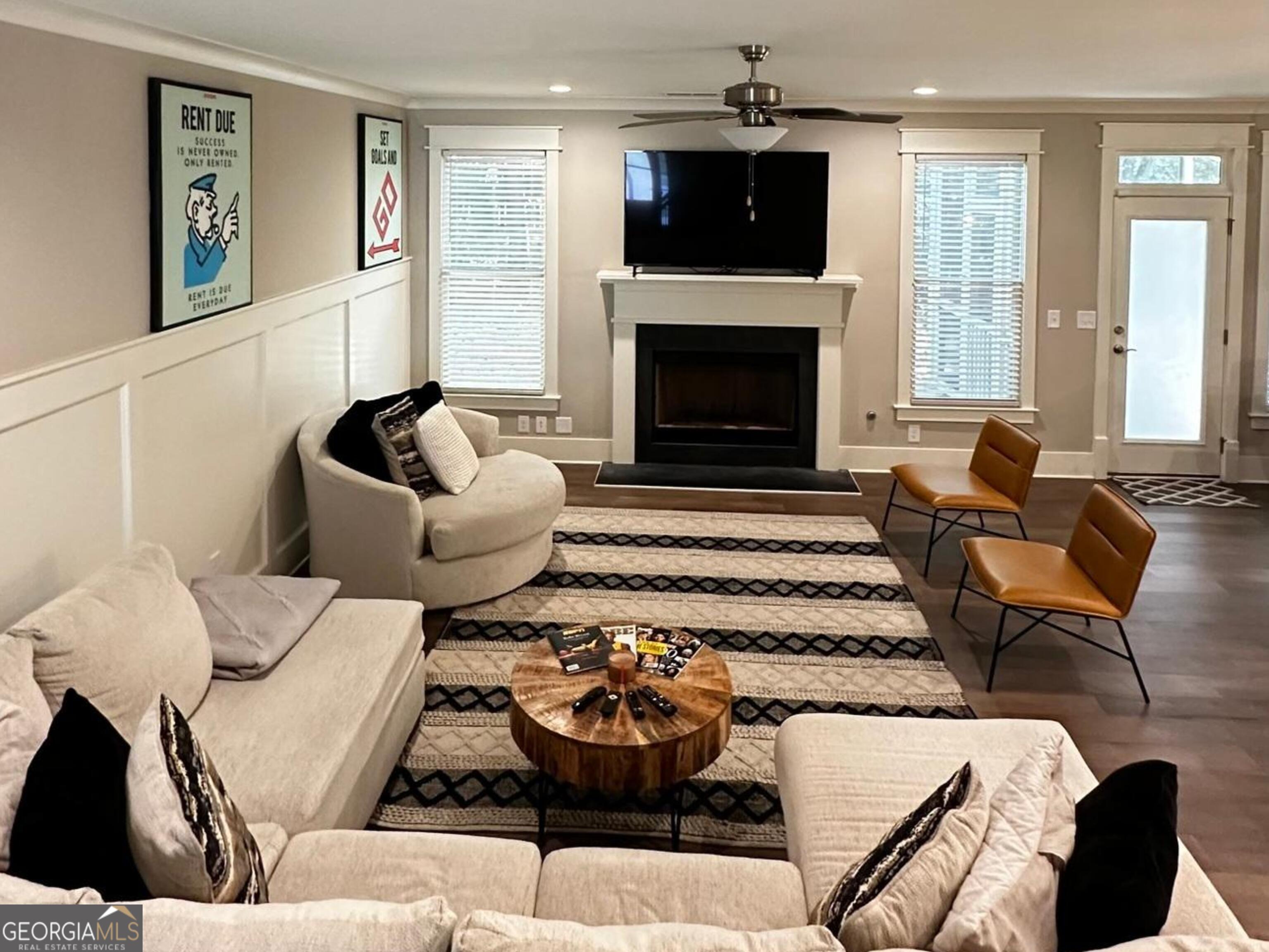 6247 Allen Ivey Road Mableton, GA 30126 - Photo 13 of 20 a living room with furniture and a fireplace