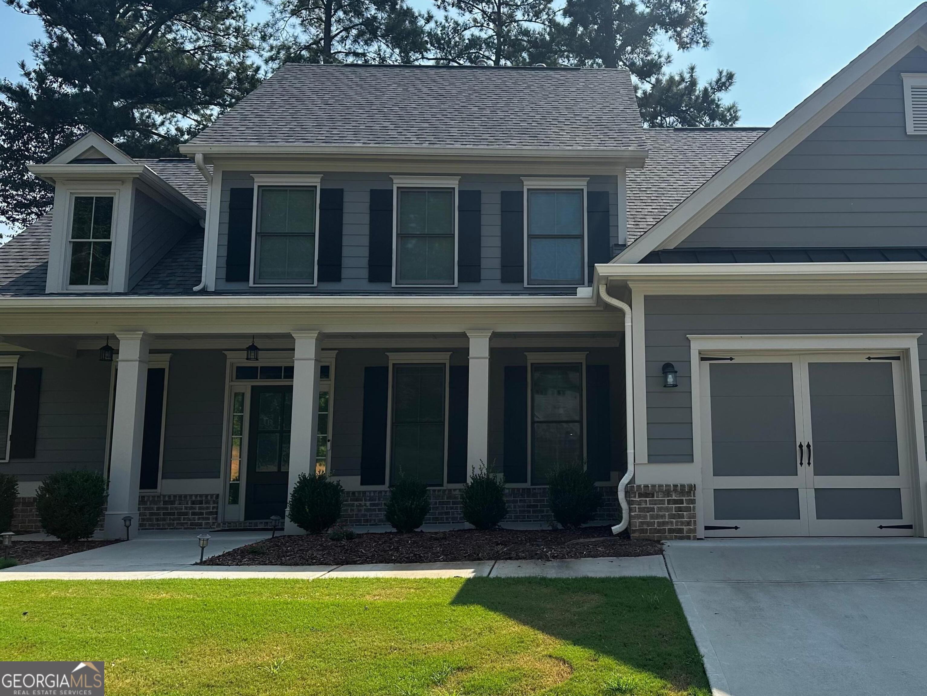 6247 Allen Ivey Road Mableton, GA 30126 - Photo 2 of 20 front view of a house with a yard
