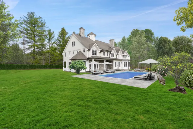 a aerial view of a house with a garden and plants