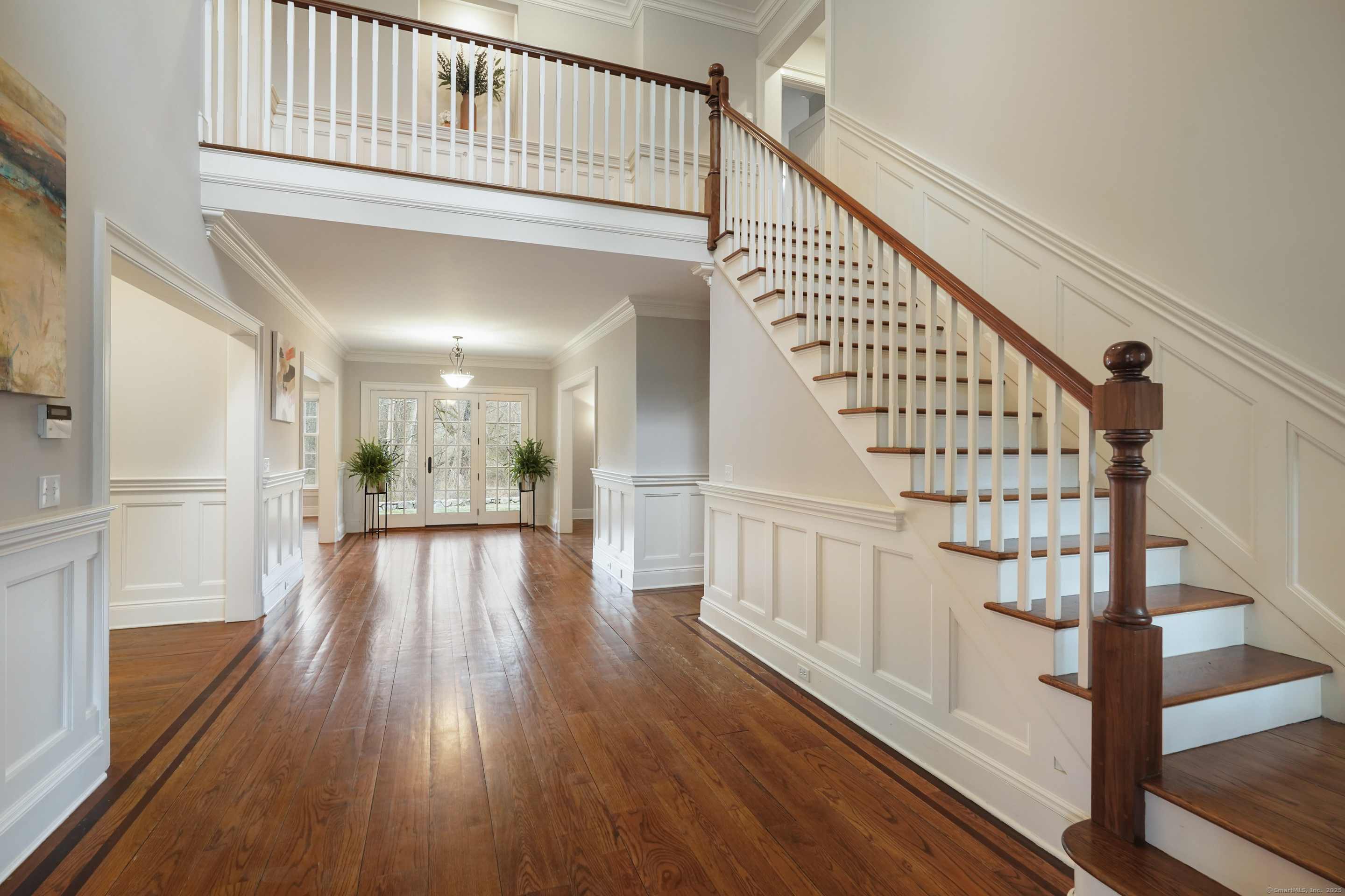 33 Middlebrook Farm Road Wilton, CT 06897 - Photo 6 of 40 a view of entryway and hall with wooden floor