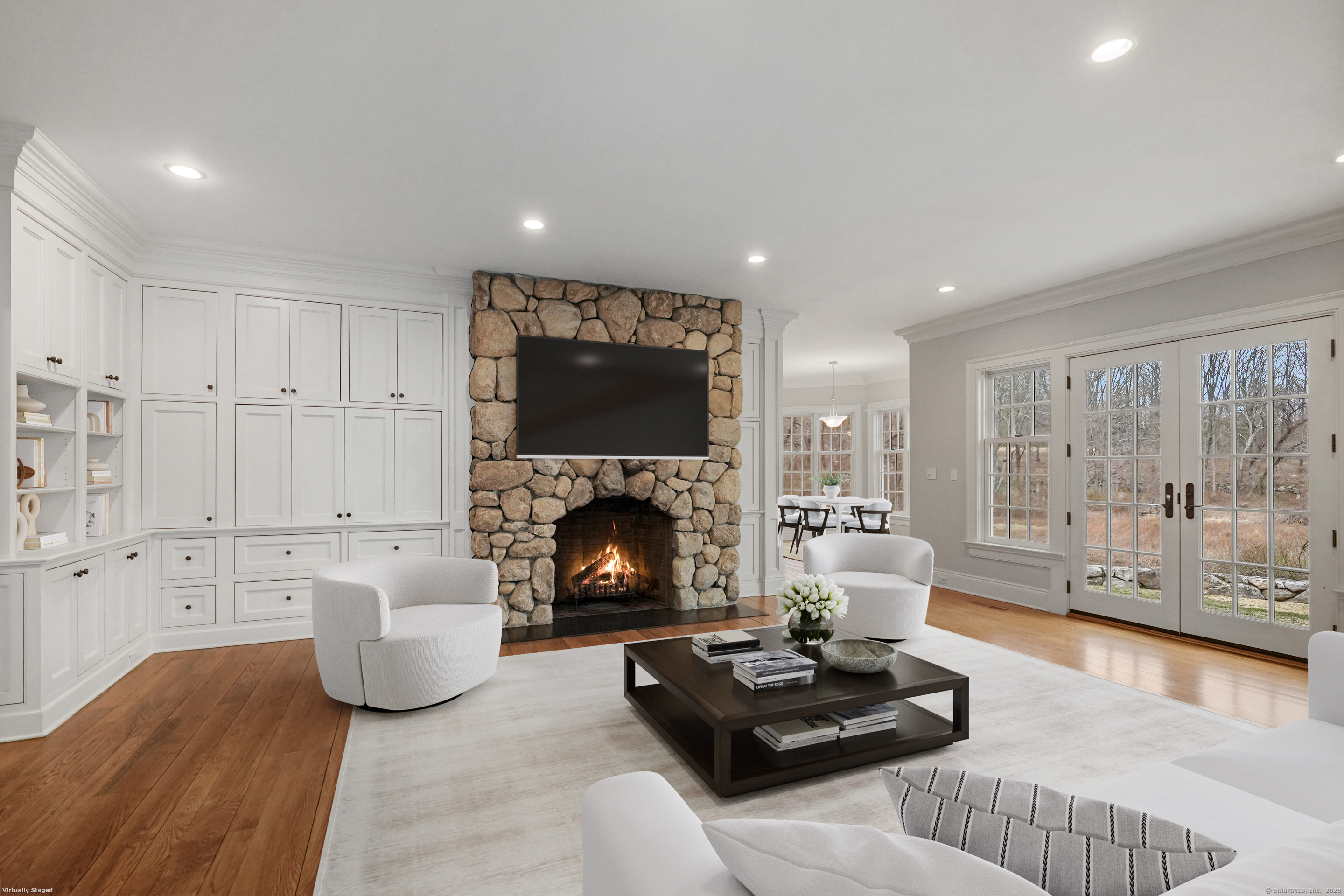 33 Middlebrook Farm Road Wilton, CT 06897 - Photo 8 of 40 a living room with furniture and a fireplace