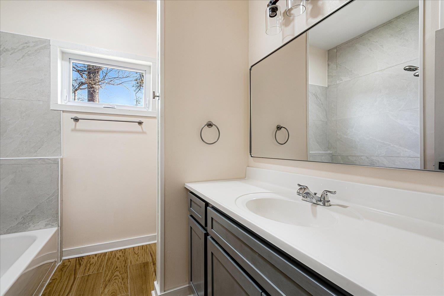 245 Ecology Loop Eads, TN 38028 - Photo 22 of 23 a bathroom with a sink and a bathtub