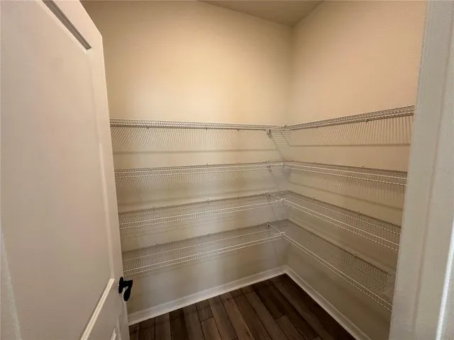 a kitchen with a stove and a cabinet