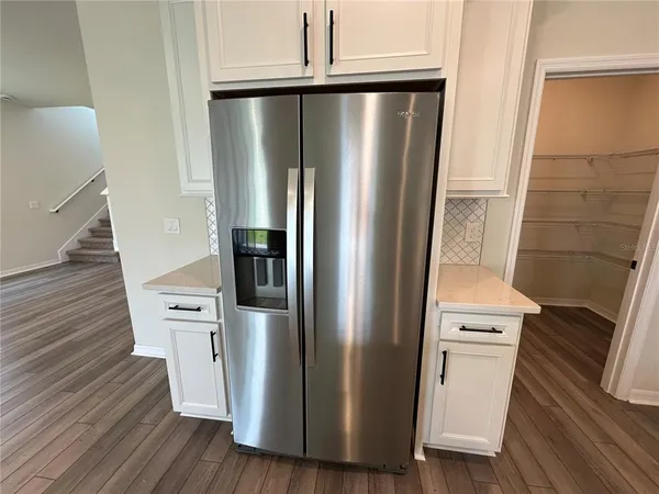 a kitchen with a sink and a stove