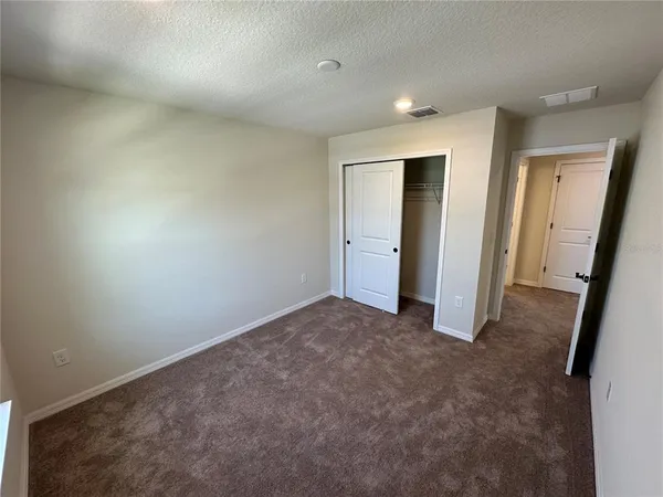 an empty room with an entryway
