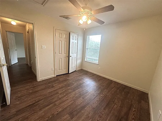 a view of a swimming pool with an outdoor space and seating area
