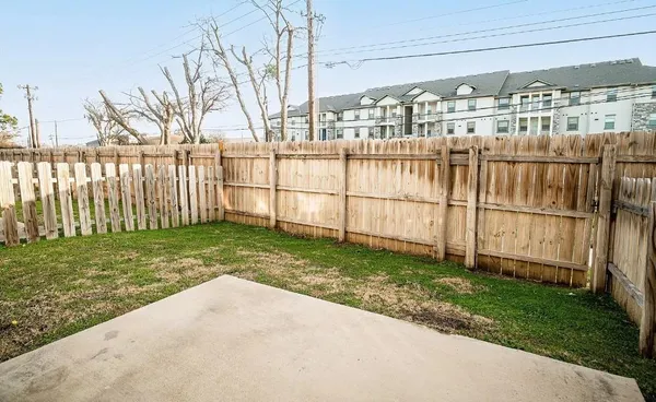 a view of a backyard with a garden