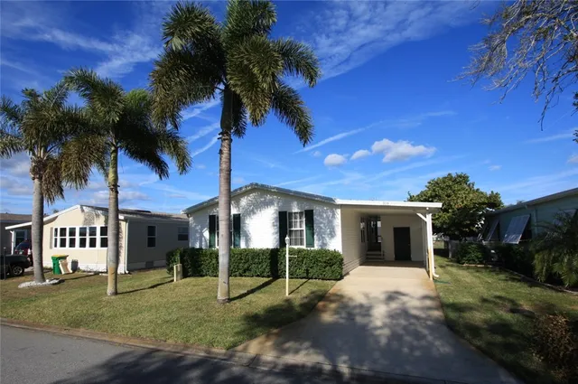 $234,900 | 318 Macadamia Drive, Barefoot Bay, FL 32976