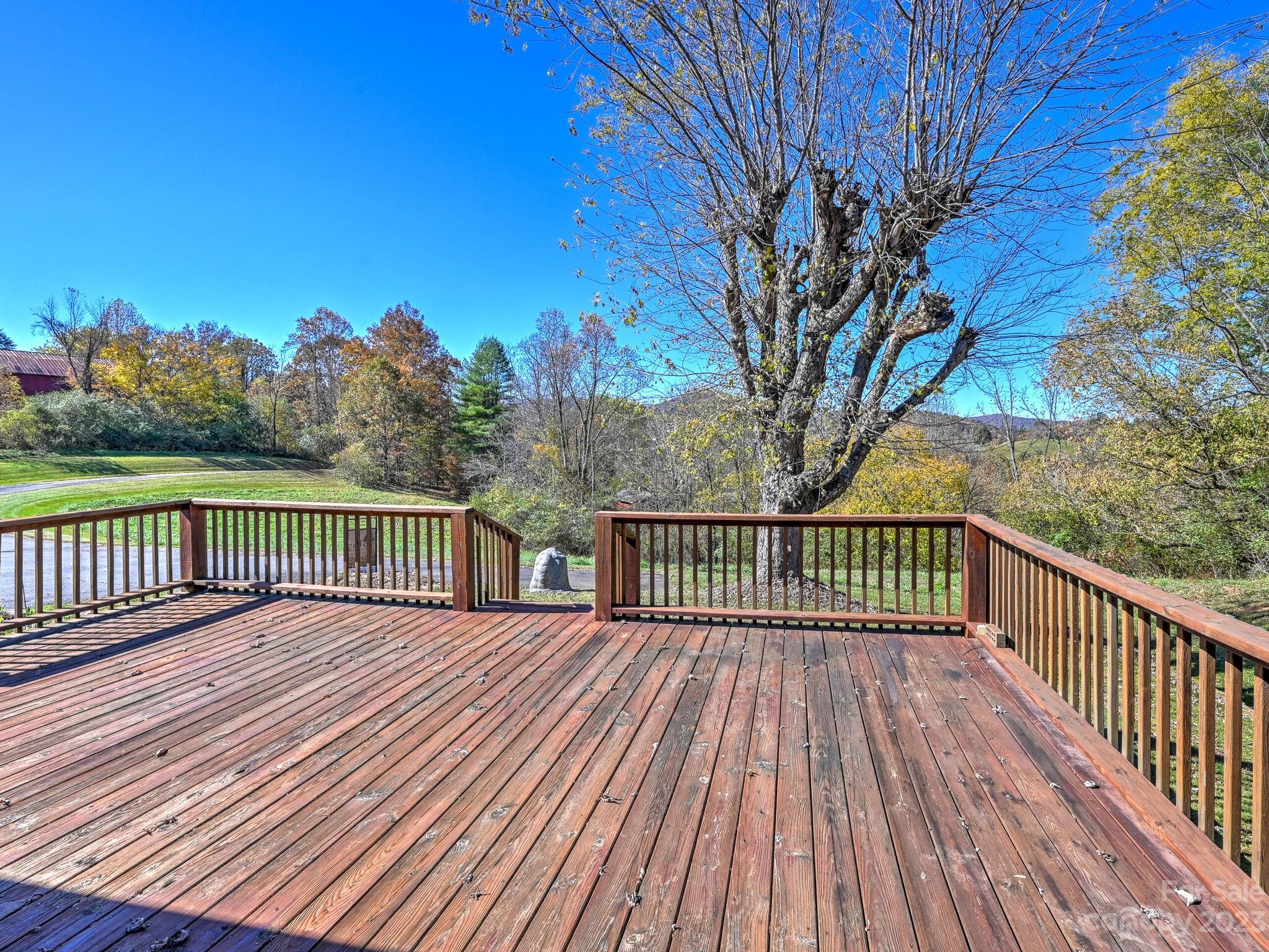 146 Old Road Marshall, NC 28753 - Photo 17 of 31 a view of a wooden deck with a yard