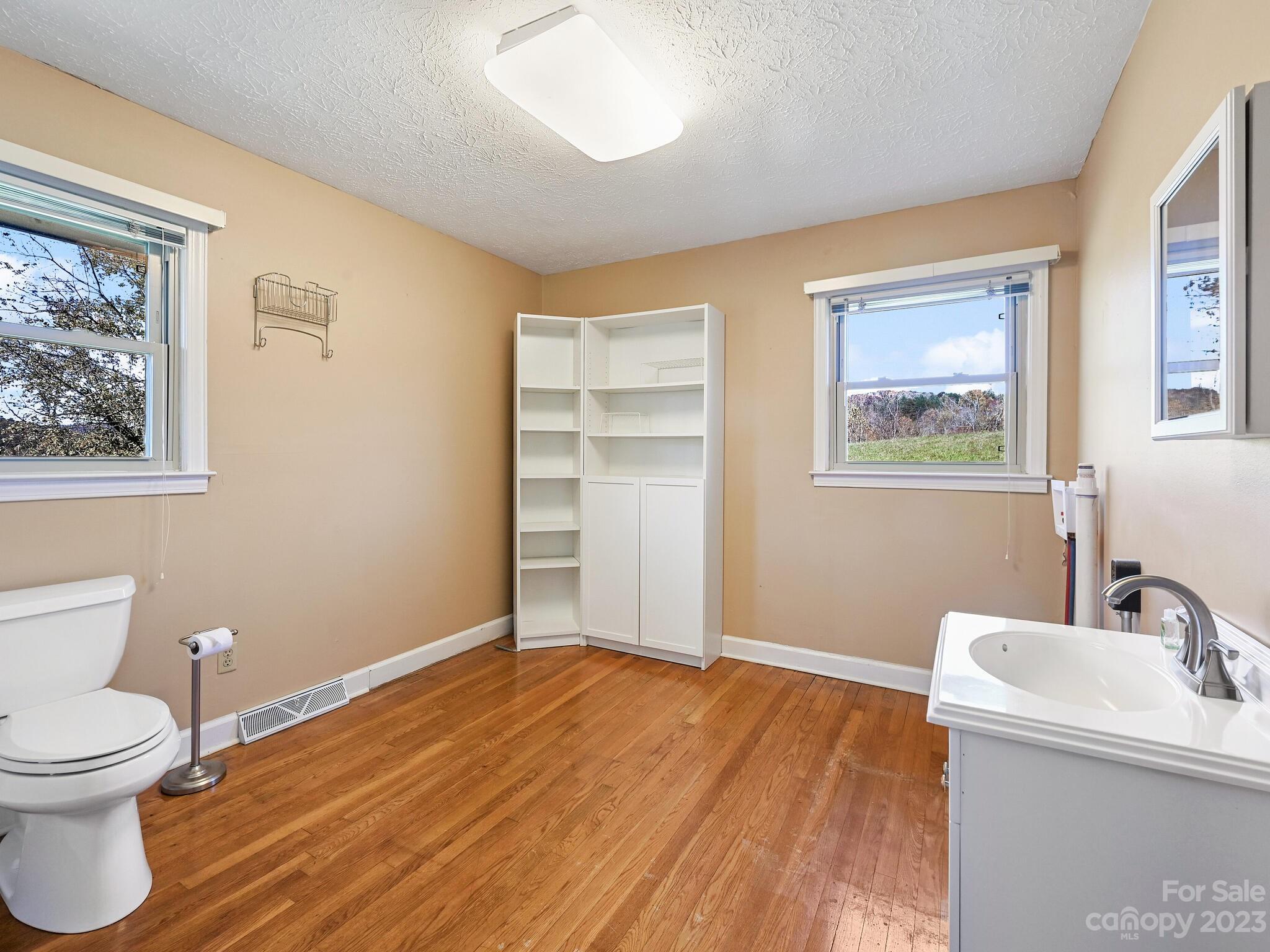 146 Old Road Marshall, NC 28753 - Photo 20 of 31 a bathroom with a sink and a toilet