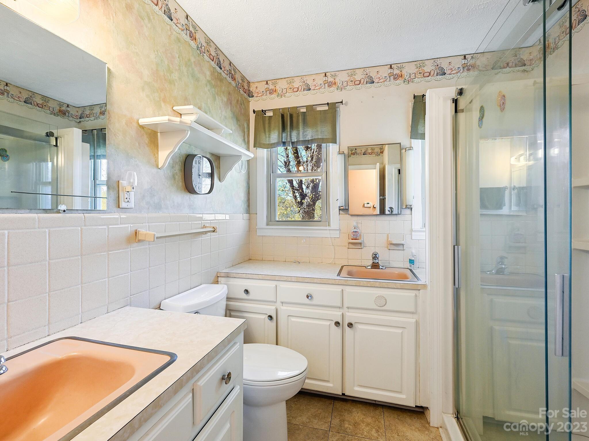 146 Old Road Marshall, NC 28753 - Photo 21 of 31 a bathroom with a sink toilet and shower