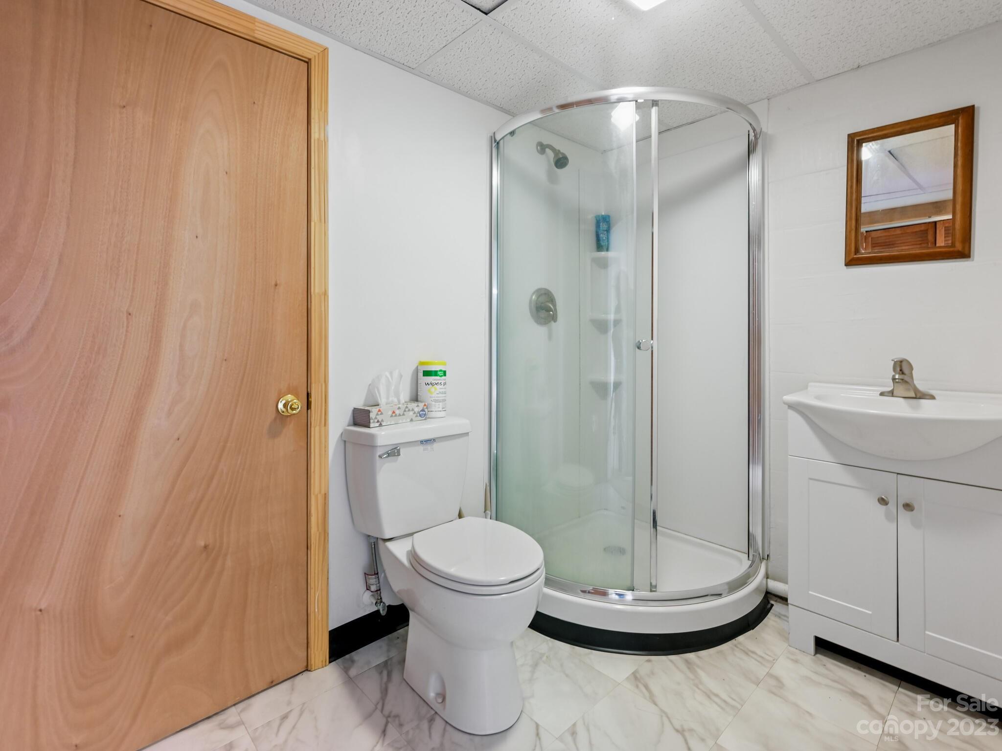 146 Old Road Marshall, NC 28753 - Photo 25 of 31 a bathroom with a toilet and a sink