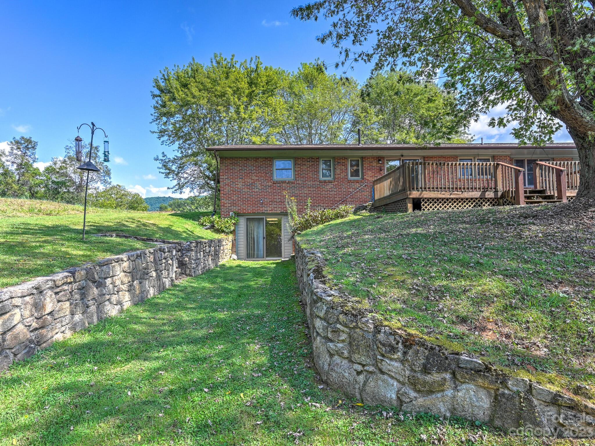 146 Old Road Marshall, NC 28753 - Photo 5 of 31 a view of a house with a yard