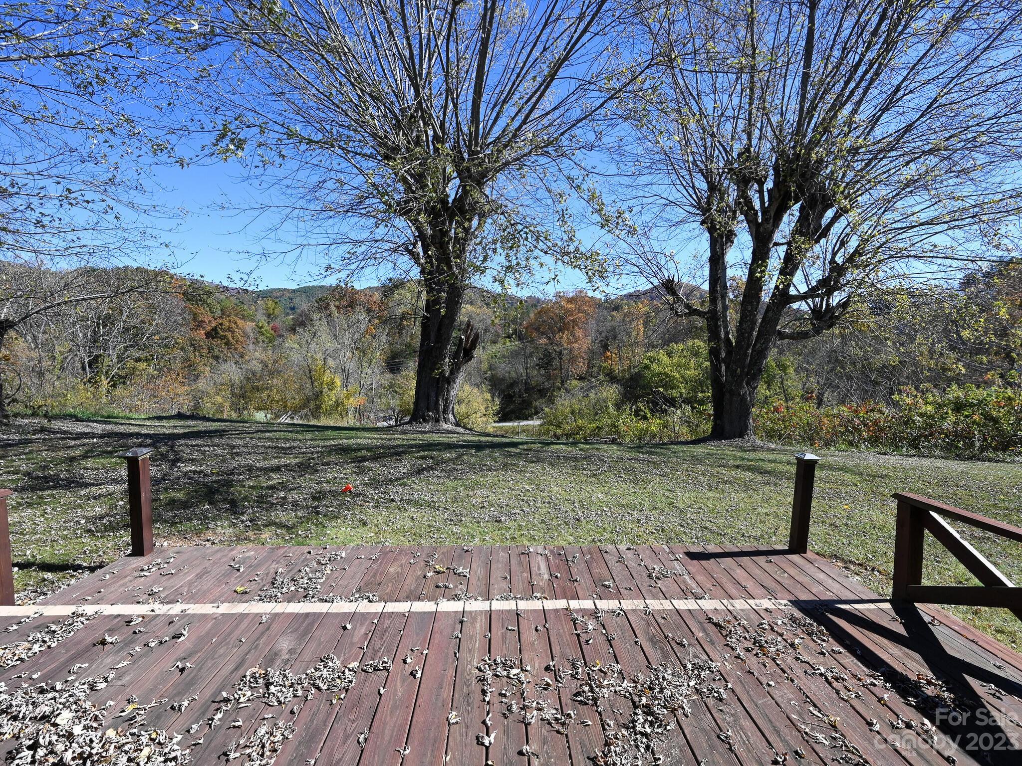 146 Old Road Marshall, NC 28753 - Photo 9 of 31 a view of a backyard with wooden fence