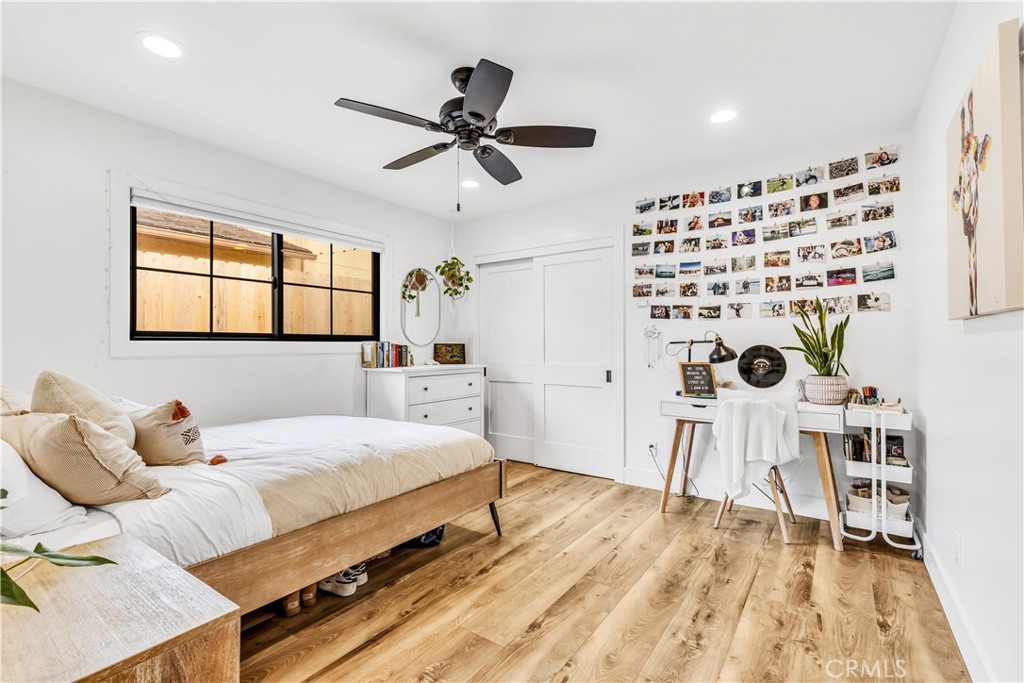 126 Avenida San Dimas San Clemente, CA 92672 - Photo 11 of 34 a bedroom with a bed and a table