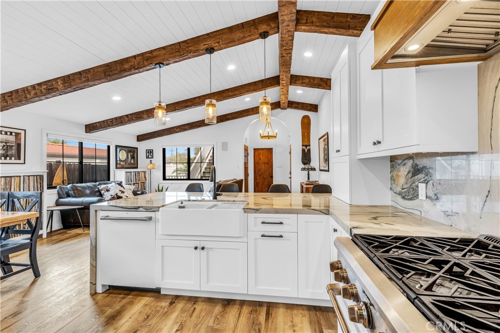 126 Avenida San Dimas San Clemente, CA 92672 - Photo 13 of 34 a kitchen with a stove and cabinets