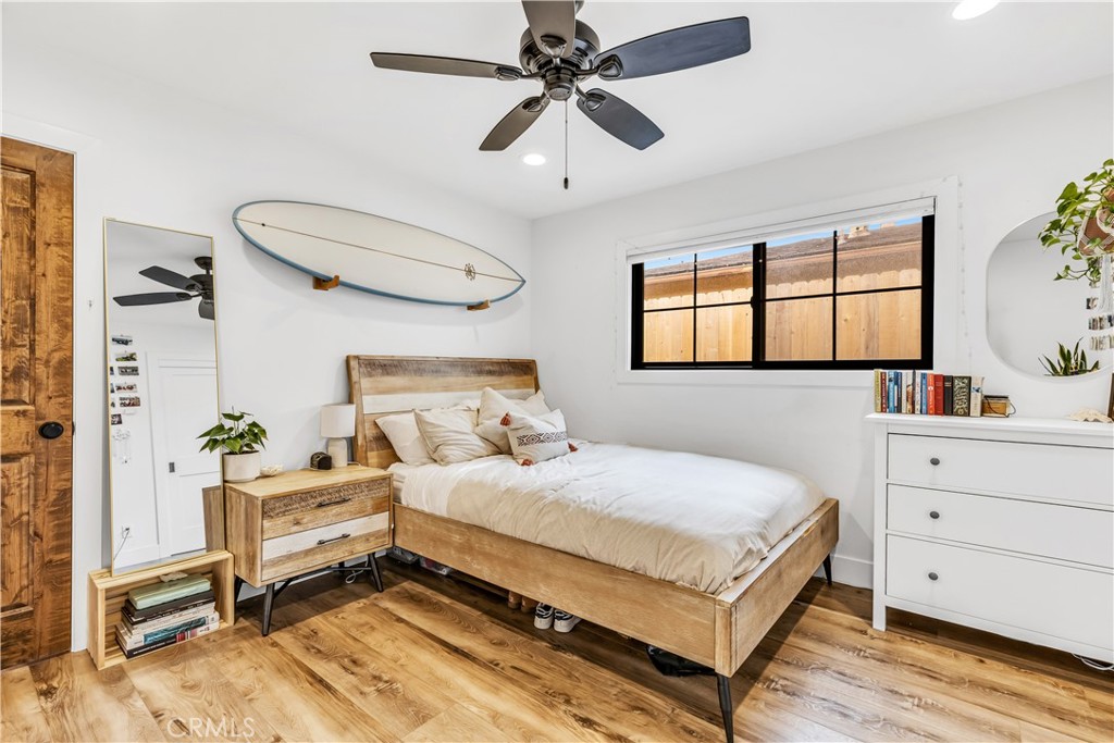 126 Avenida San Dimas San Clemente, CA 92672 - Photo 22 of 34 a bedroom with a bed and a dresser