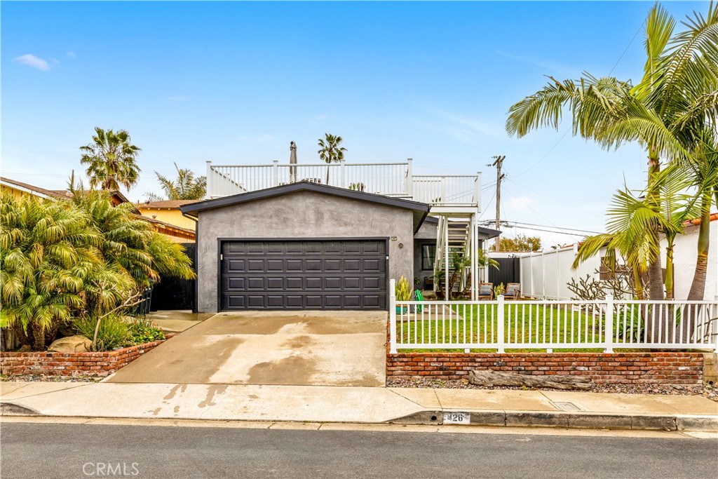 126 Avenida San Dimas San Clemente, CA 92672 - Photo 24 of 34 a front view of a house with a yard