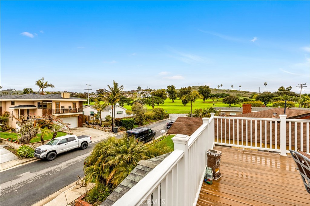 126 Avenida San Dimas San Clemente, CA 92672 - Photo 28 of 34 a view of a balcony with cars parked