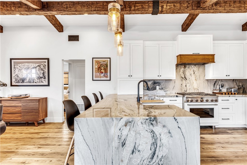 126 Avenida San Dimas San Clemente, CA 92672 - Photo 4 of 34 a living room with furniture stove and kitchen view