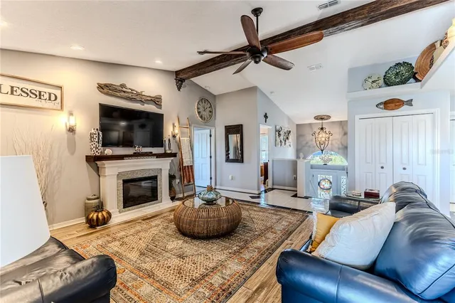 a kitchen with stainless steel appliances kitchen island granite countertop a stove and cabinets