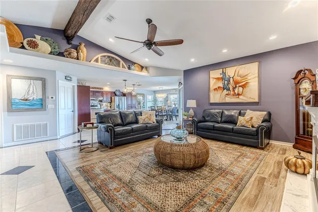 a room with dining table and wooden floor