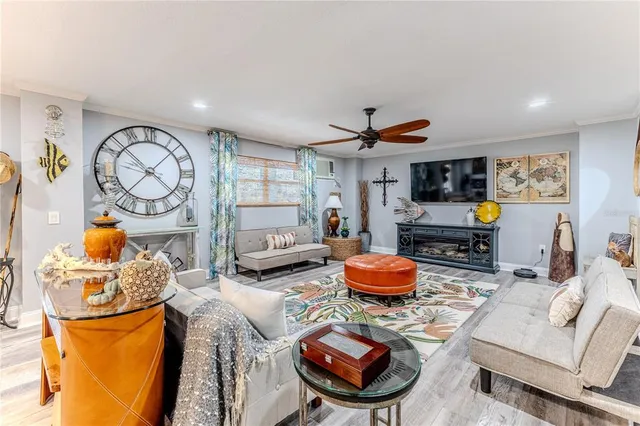 a bathroom with a granite countertop sink a toilet and mirror