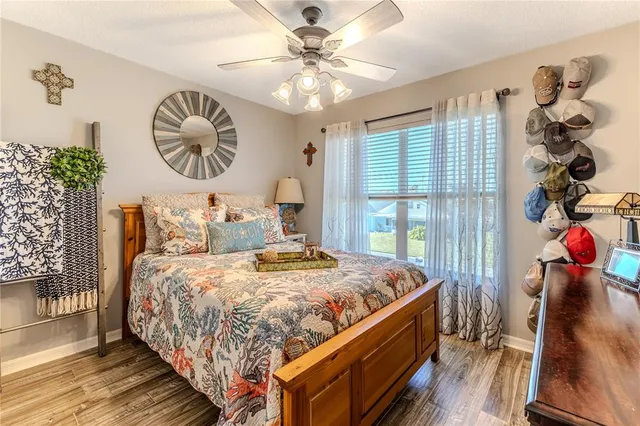 a view of a house with a swimming pool and a yard