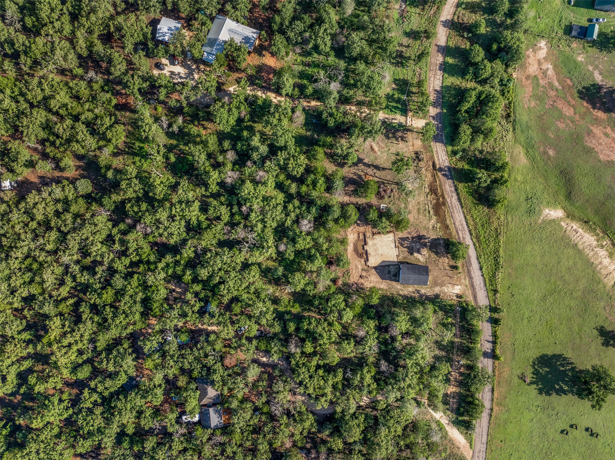 Tbd Lincoln Lake Road Paige, TX 78659 - Photo 13 of 29 an aerial view of a house with a yard