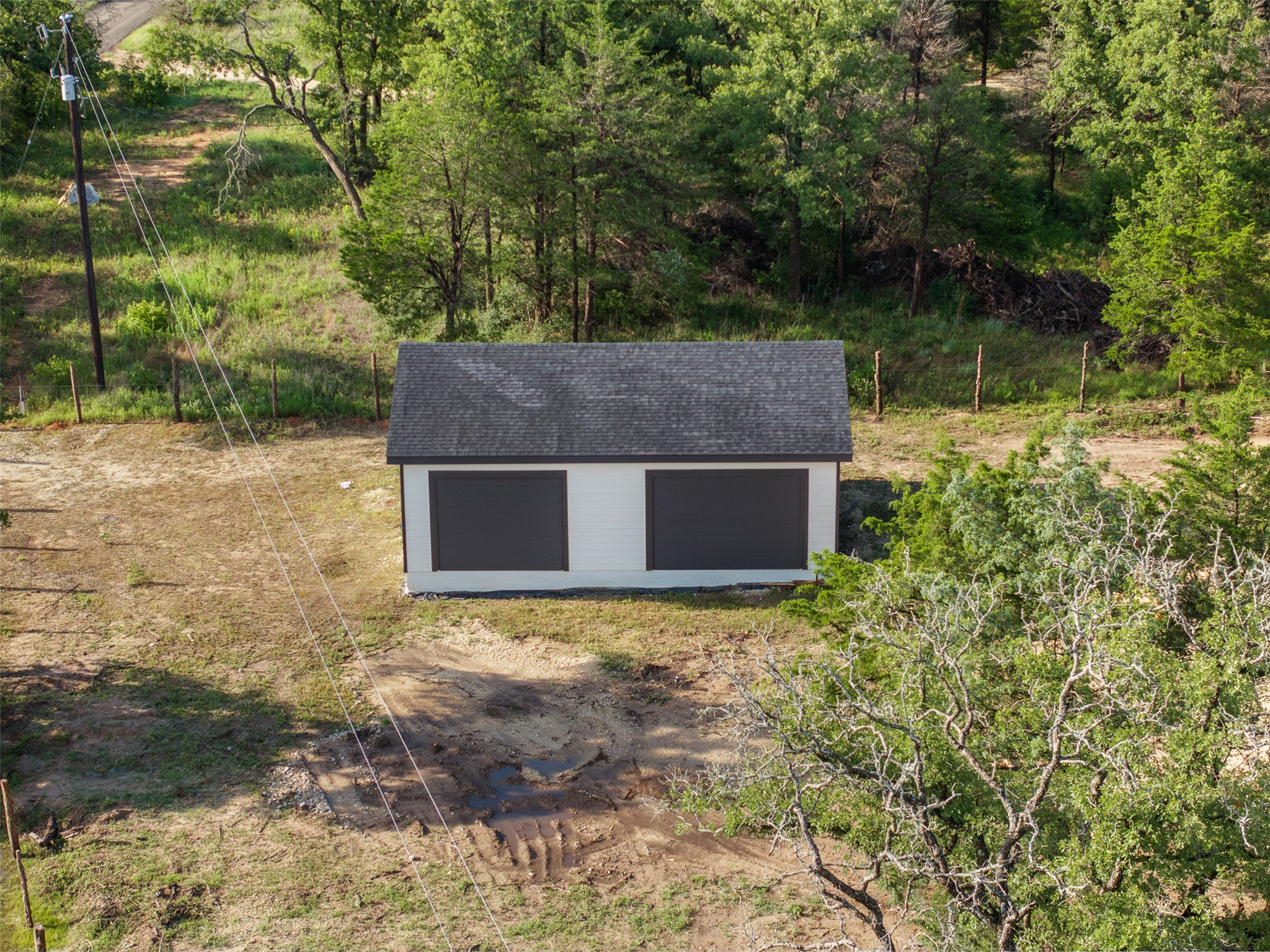 Tbd Lincoln Lake Road Paige, TX 78659 - Photo 23 of 29 a front view of a house with a yard