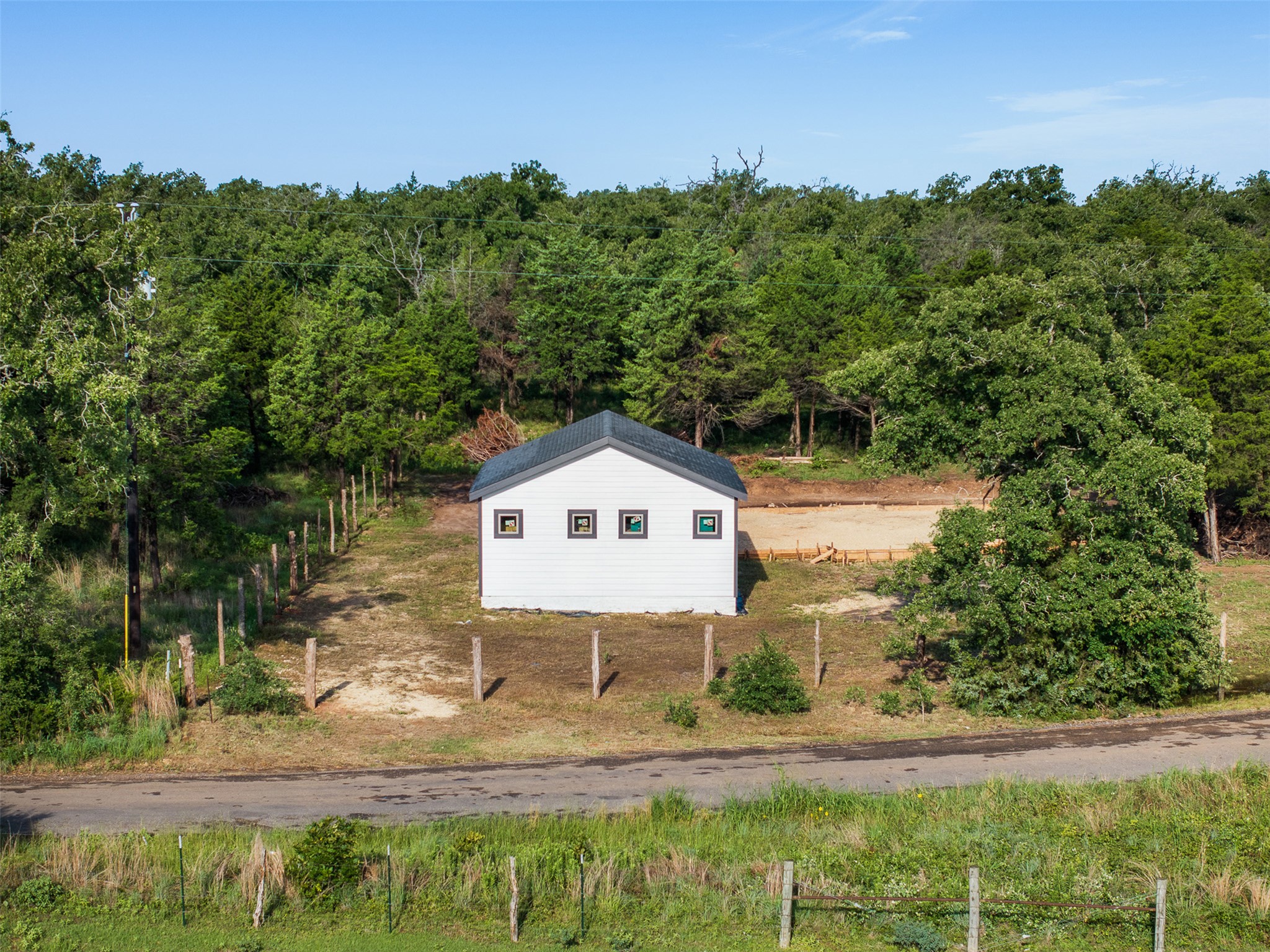 Tbd Lincoln Lake Road Paige, TX 78659 - Photo 24 of 29 a view of a yard and front view of a house