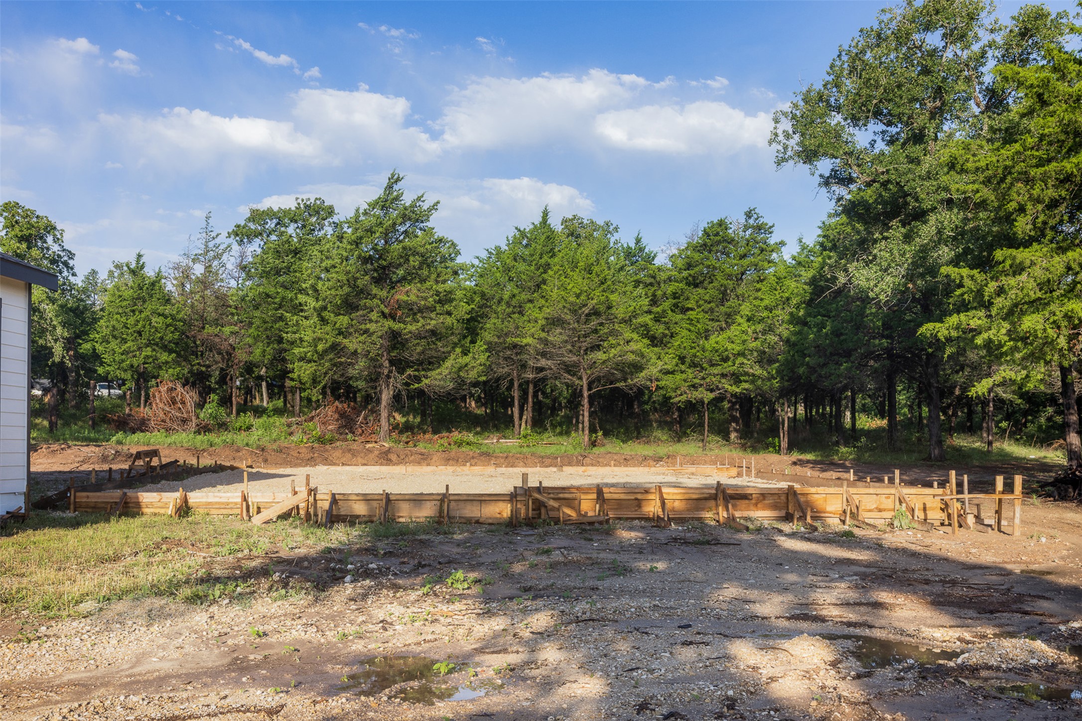 Tbd Lincoln Lake Road Paige, TX 78659 - Photo 6 of 29 a view of a yard with trees in the background