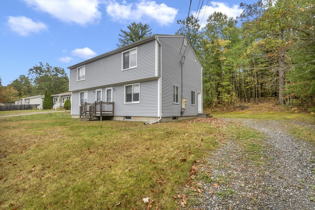55-a B Randall Road Montague, MA 01351 - Photo 3 of 33 a front view of house with yard