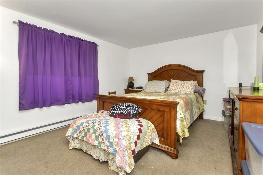 55-a B Randall Road Montague, MA 01351 - Photo 9 of 33 a bedroom with a bed and window