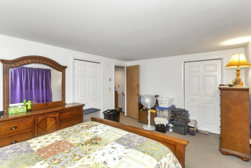 55-a B Randall Road Montague, MA 01351 - Photo 10 of 33 a bed room with a bed and a dresser
