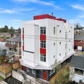 a large white building with a white roof