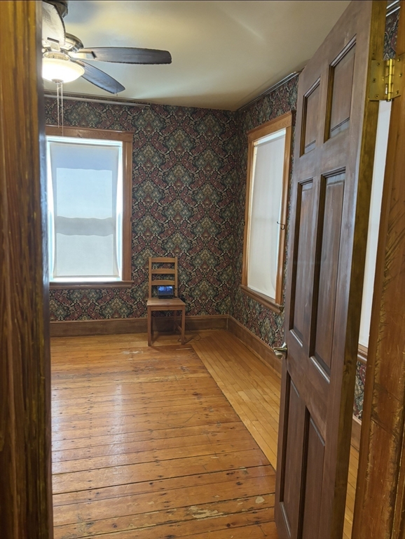 13 Moulton Street Lynn, MA 01905 - Photo 4 of 18 a bathroom with a sink and a mirror