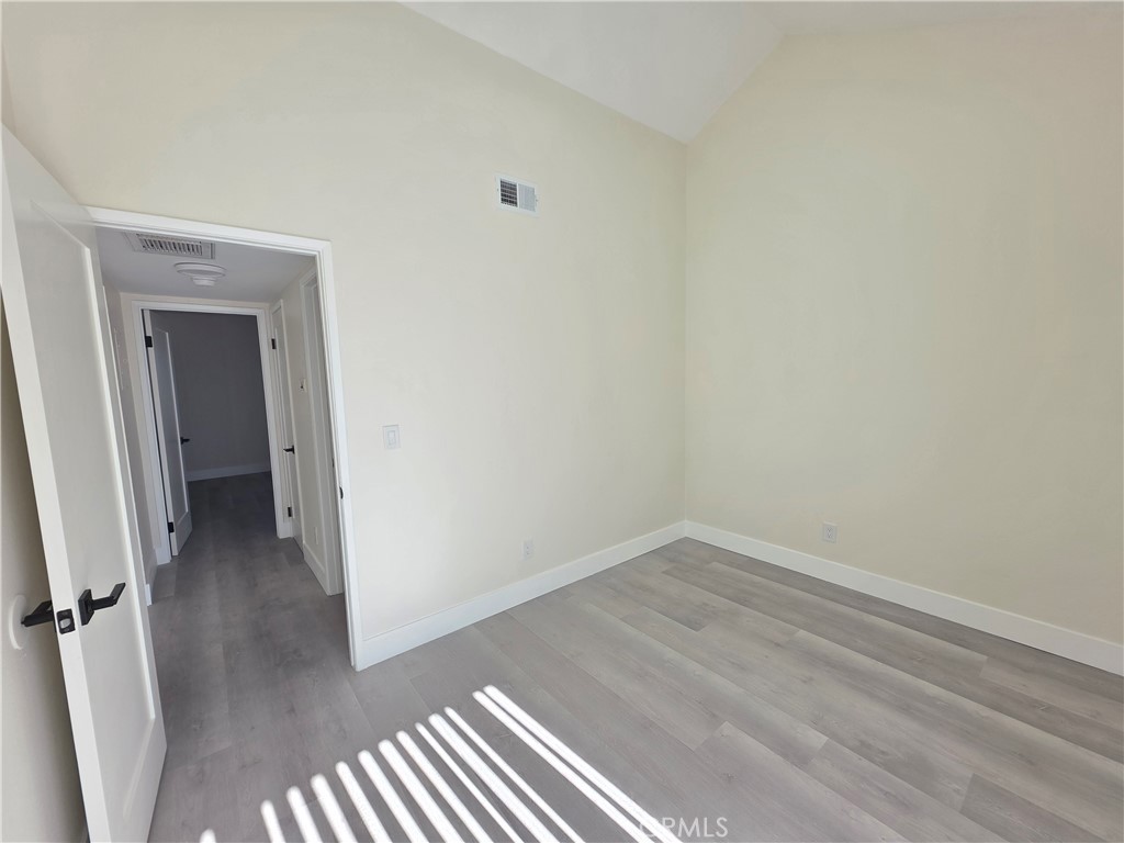 44155 10th Lancaster, CA 93534 - Photo 7 of 14 a view of a small space with wooden floor