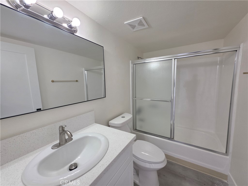 44155 10th Lancaster, CA 93534 - Photo 10 of 14 a bathroom with a sink toilet and shower