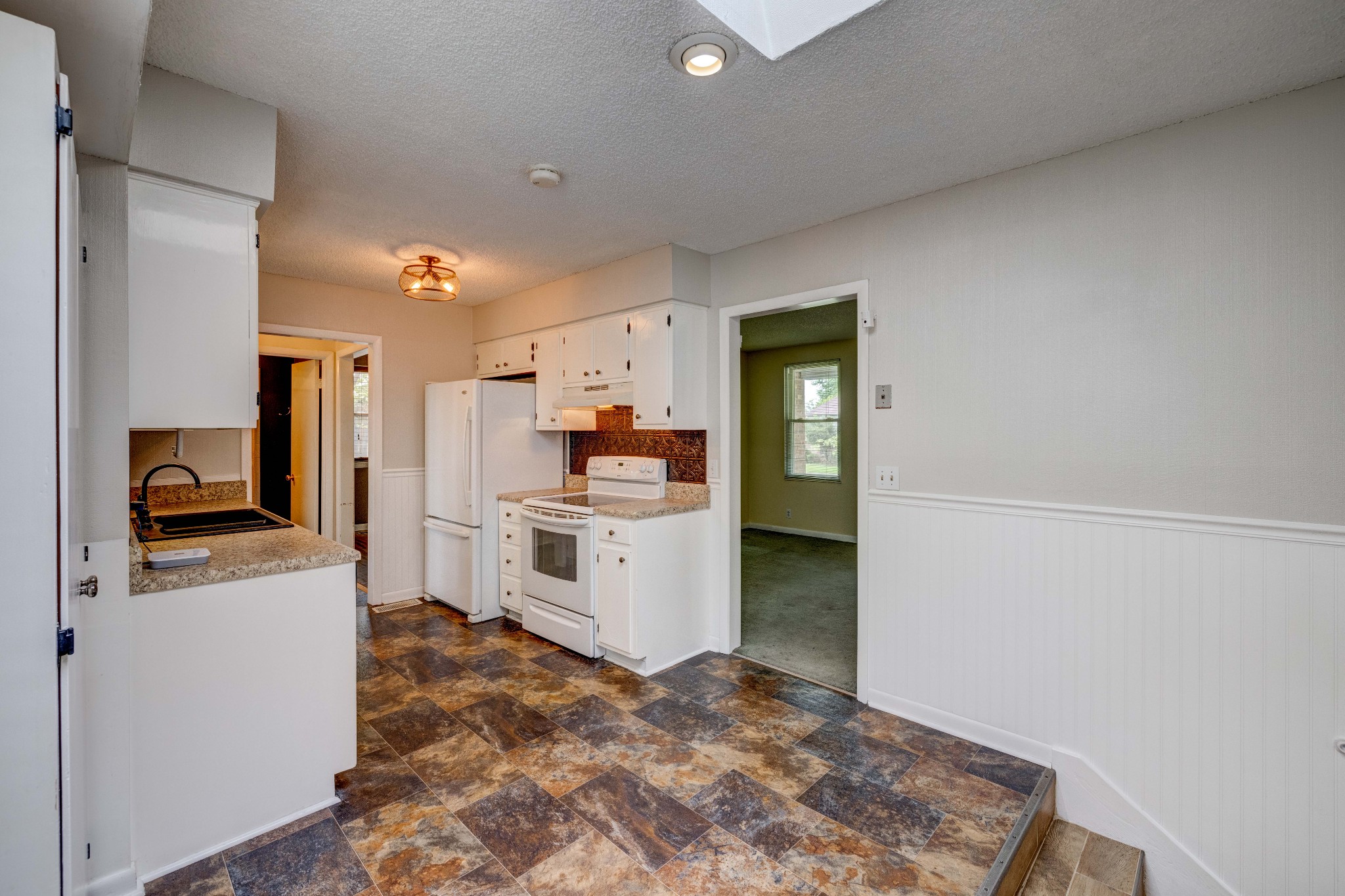 3312 Country Way Road Antioch, TN 37013 - Photo 12 of 35 a kitchen with a refrigerator and a stove top oven