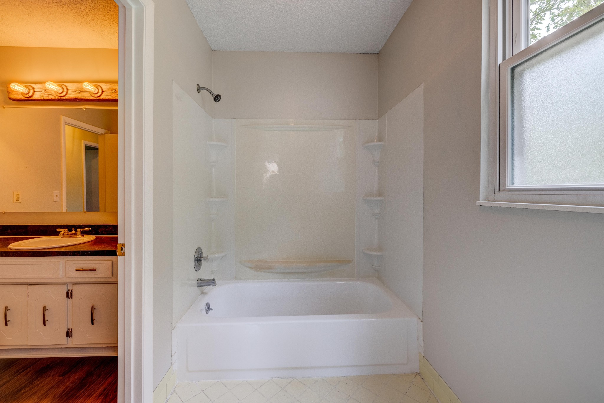 3312 Country Way Road Antioch, TN 37013 - Photo 21 of 35 a bathroom with a bathtub a toilet and a shower