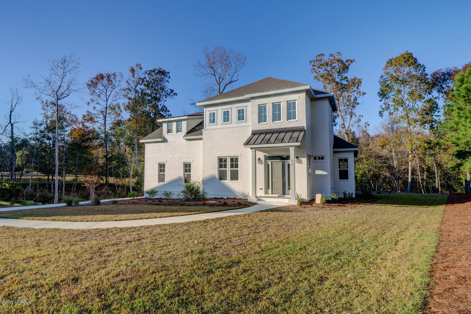 415 Compass Point Hampstead, NC 28443 - Photo 1 of 50 Front
