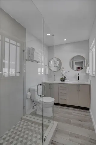 a view of a bathroom sink and mirror