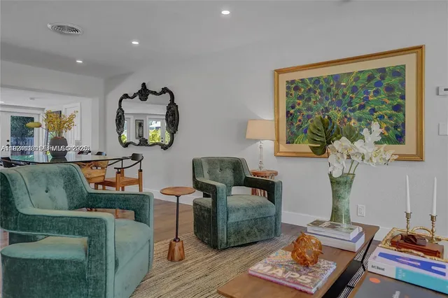 a living room with furniture and a window