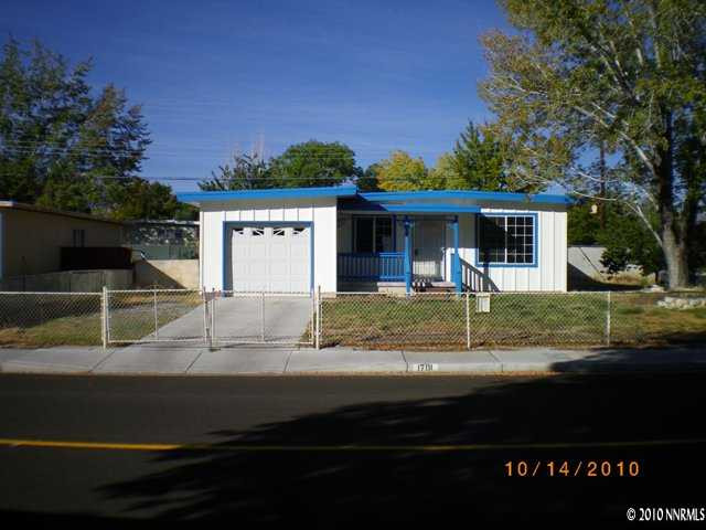 1701 Radcliffe Drive Reno, NV 89502 - Photo 1 of 7 a front view of a house with garden
