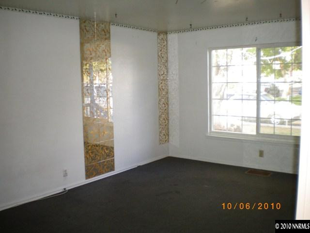 1701 Radcliffe Drive Reno, NV 89502 - Photo 4 of 7 a view of an empty room with a window
